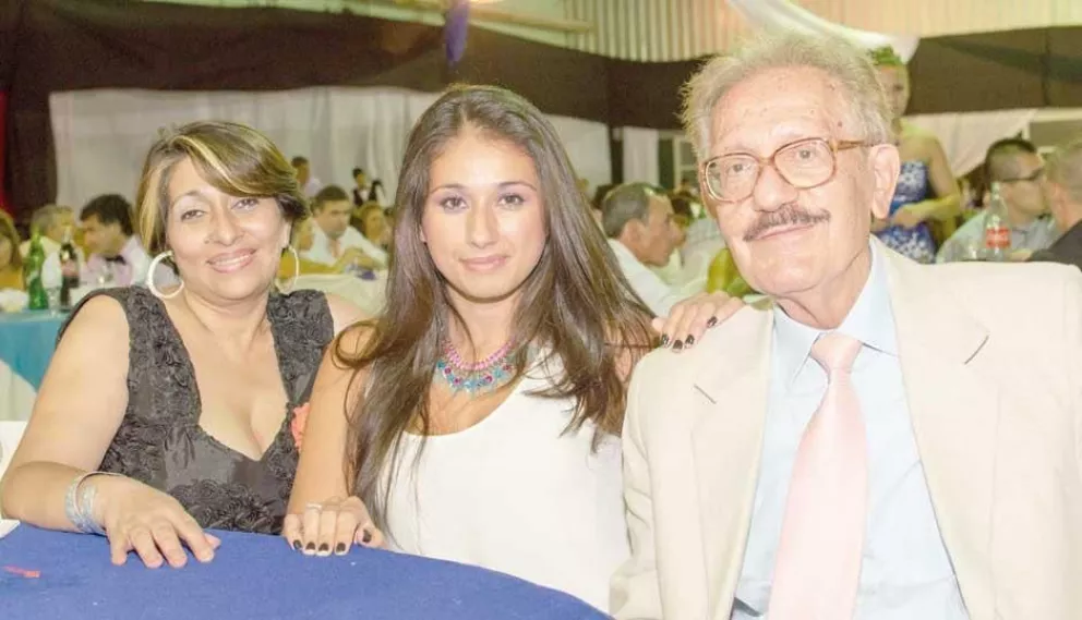 Ángela Pereyra, Nohemí González y Giorgio Mesturini, en la recepción de la Normal Mixta.