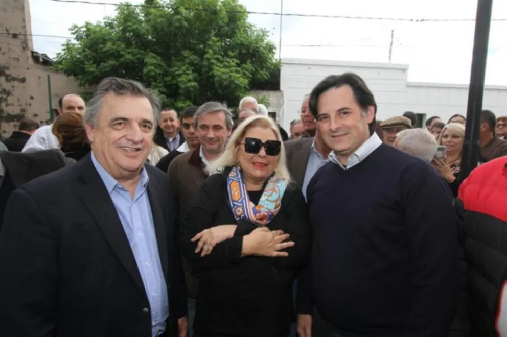 Mario Raúl Negri y Elisa Carrió