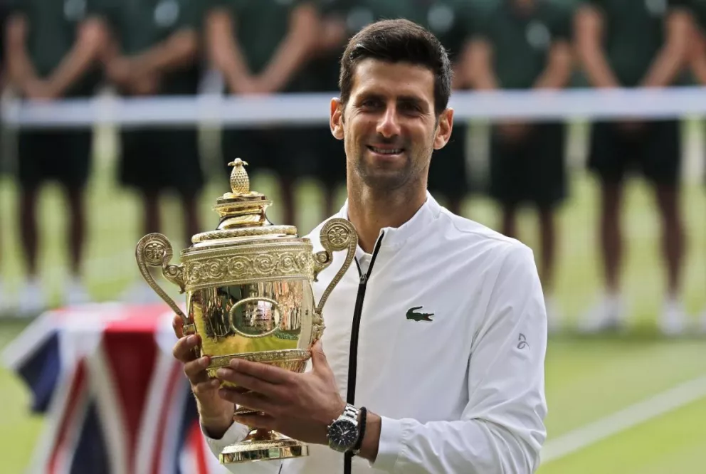 Djokovic venció a Federer y se consagró campeón de Wimbledon en la final más larga de la historia